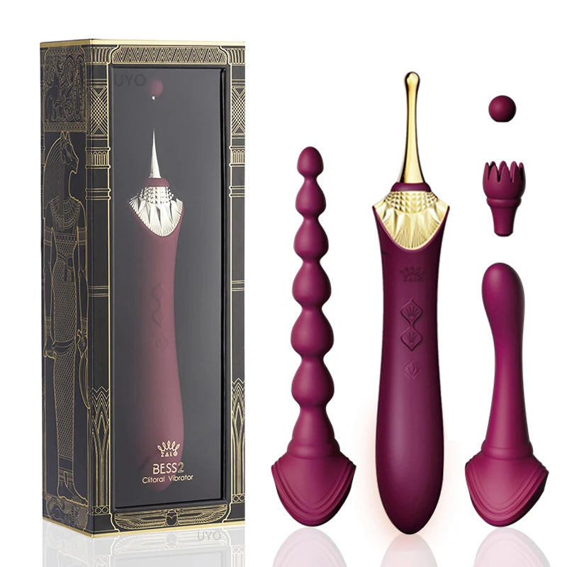 The Ladys Haven Boutique luxury vibrator gift box burgundy clitoral vibrator with gold accents and multiple attachments