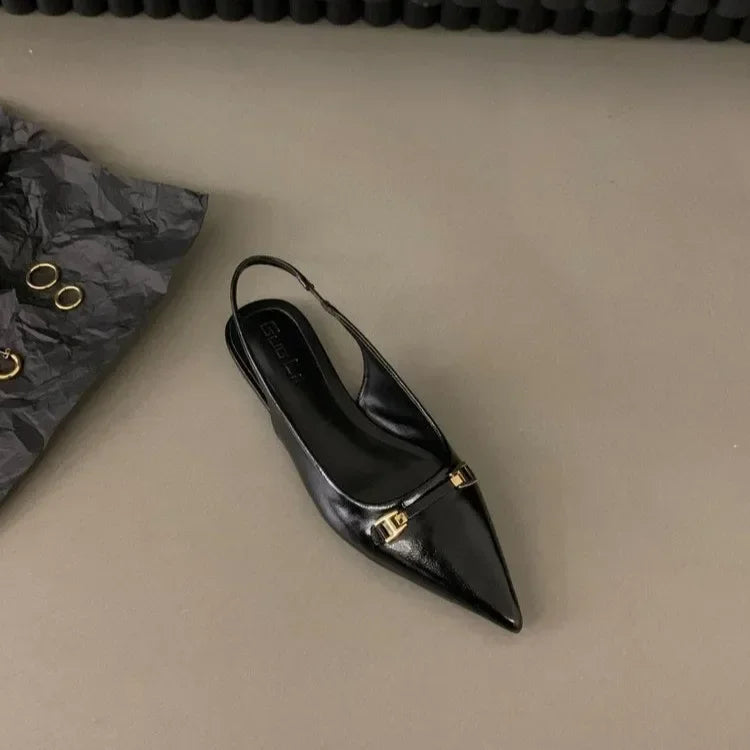 Black leather pointed toe mid heel sandals with gold buckle detail from The Lady's Haven Boutique