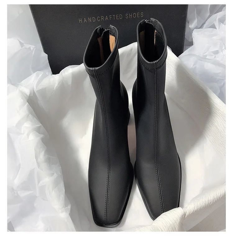 Black fashion boots with back zipper made from smooth leather by The Lady's Haven Boutique