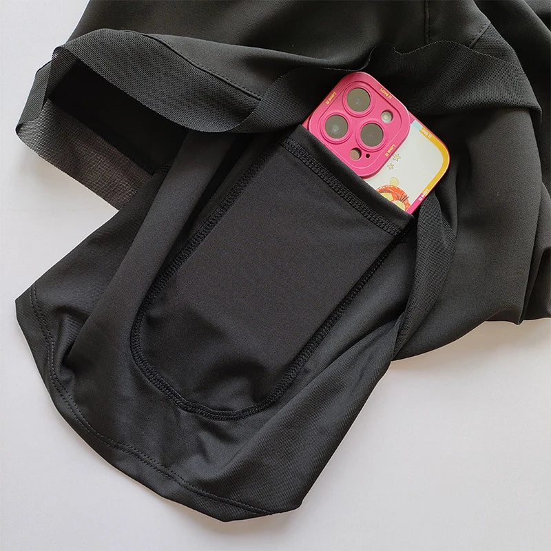 Black high-waisted sports shorts women with side pocket for convenience and style