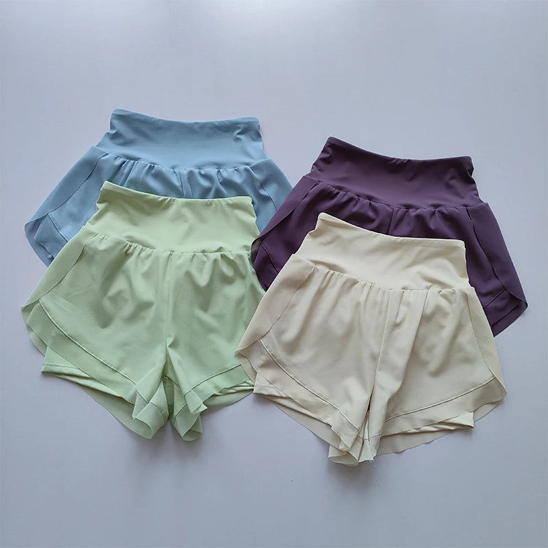 High-waisted sports shorts women in blue, purple, green, and beige for comfortable active wear