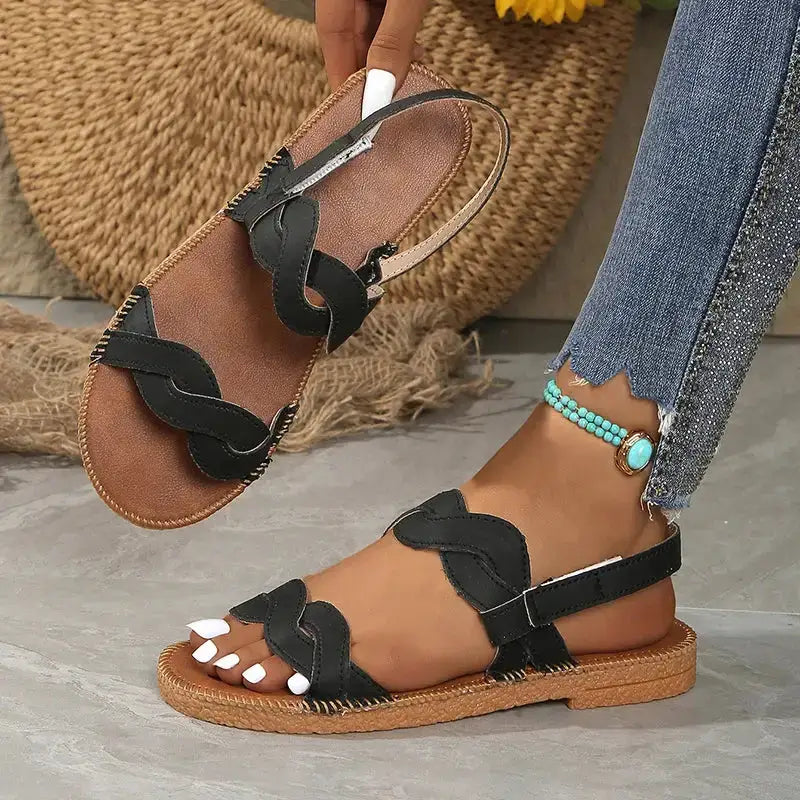 The Lady's Haven Boutique non slip flat heel summer sandals in black with braided straps and adjustable ankle strap