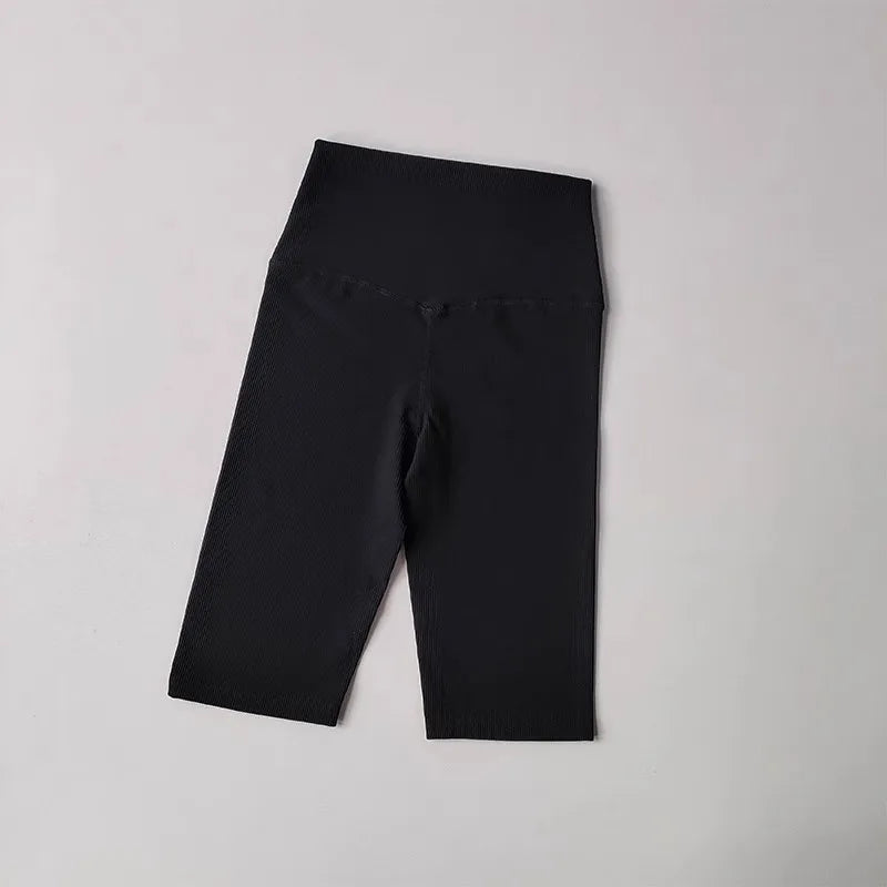 Black ribbed cycling yoga gym shorts for women with a high waistband for comfort and support
