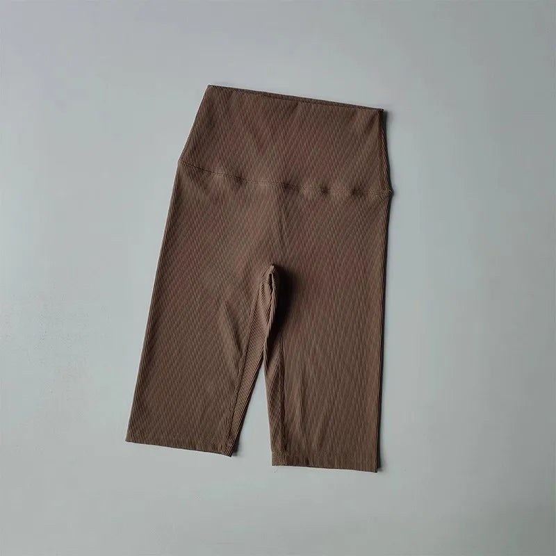 Ribbed cycling yoga gym shorts for women in a soft brown color, perfect for workouts and casual wear