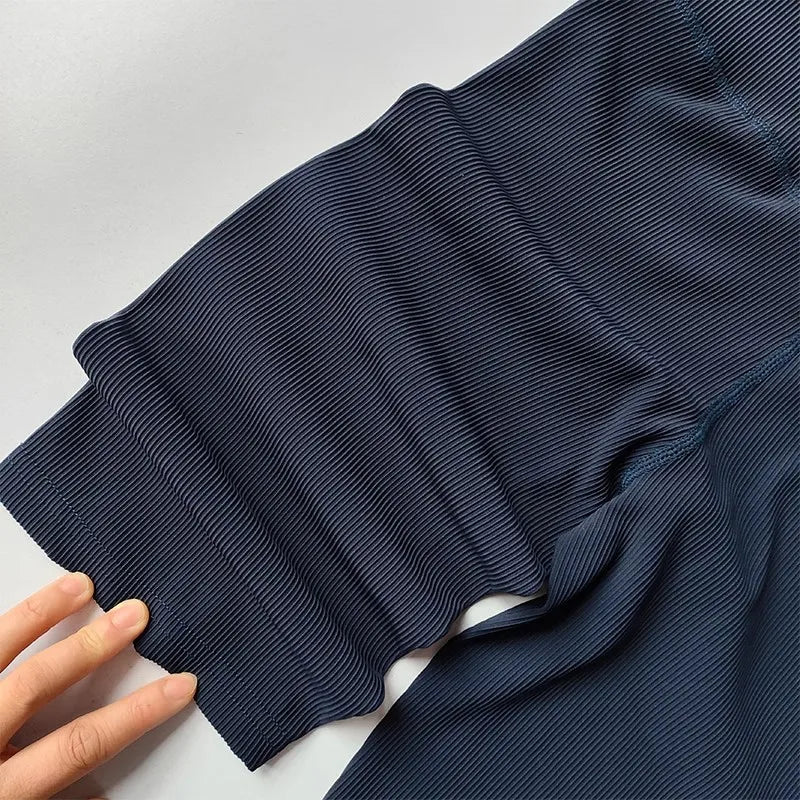 Close-up of ribbed cycling yoga gym shorts for women in navy with soft fabric and comfortable fit