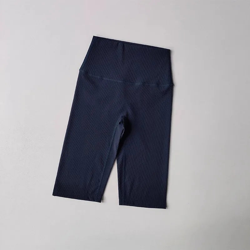 Dark blue ribbed cycling yoga gym shorts for women with a high waistband for comfort during workouts