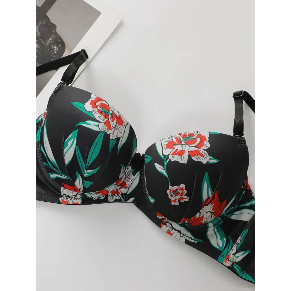 Black sexy floral bra and panty set with red and white flowers and green leaves from The Lady's Haven Boutique