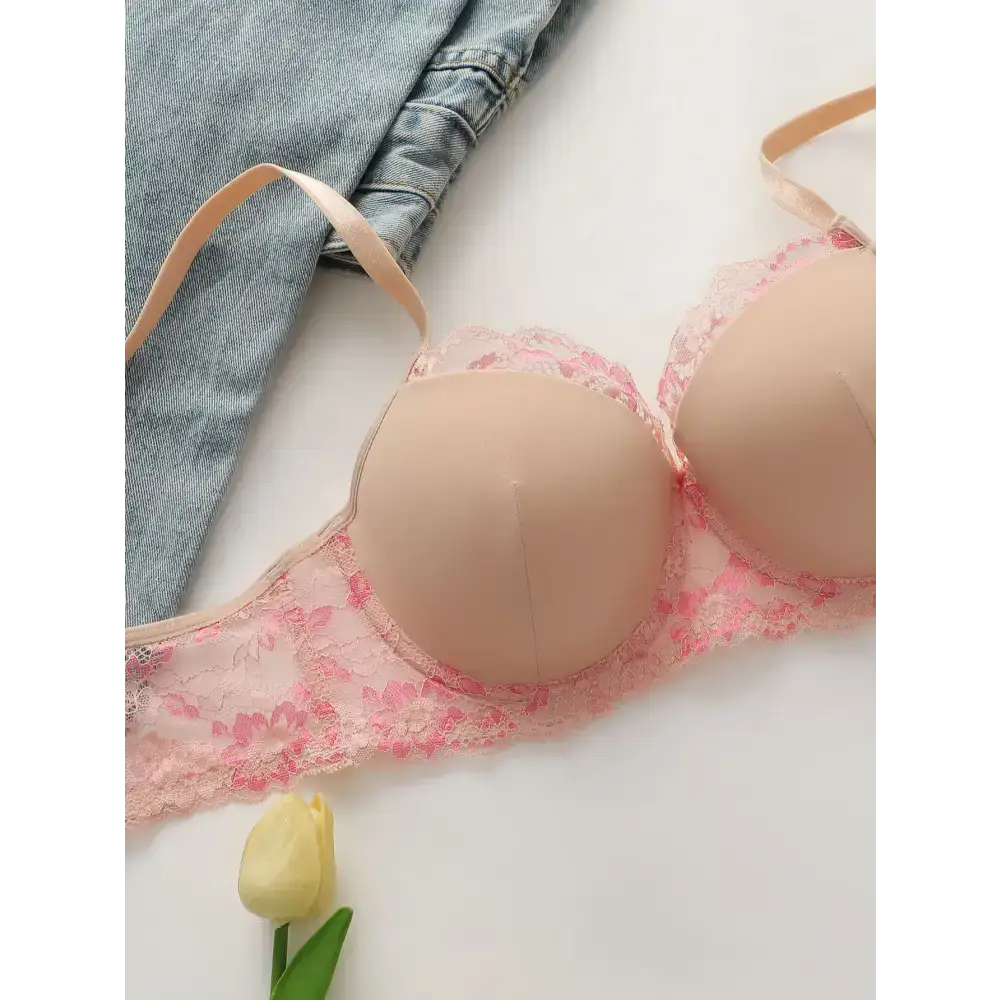 Sexy lace lingerie set in soft pink with floral lace details and adjustable straps from The Lady's Haven Boutique