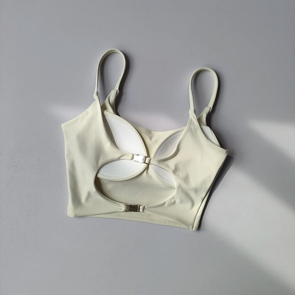 Light beige sports underwear for ladies with a stylish cutout design and adjustable straps