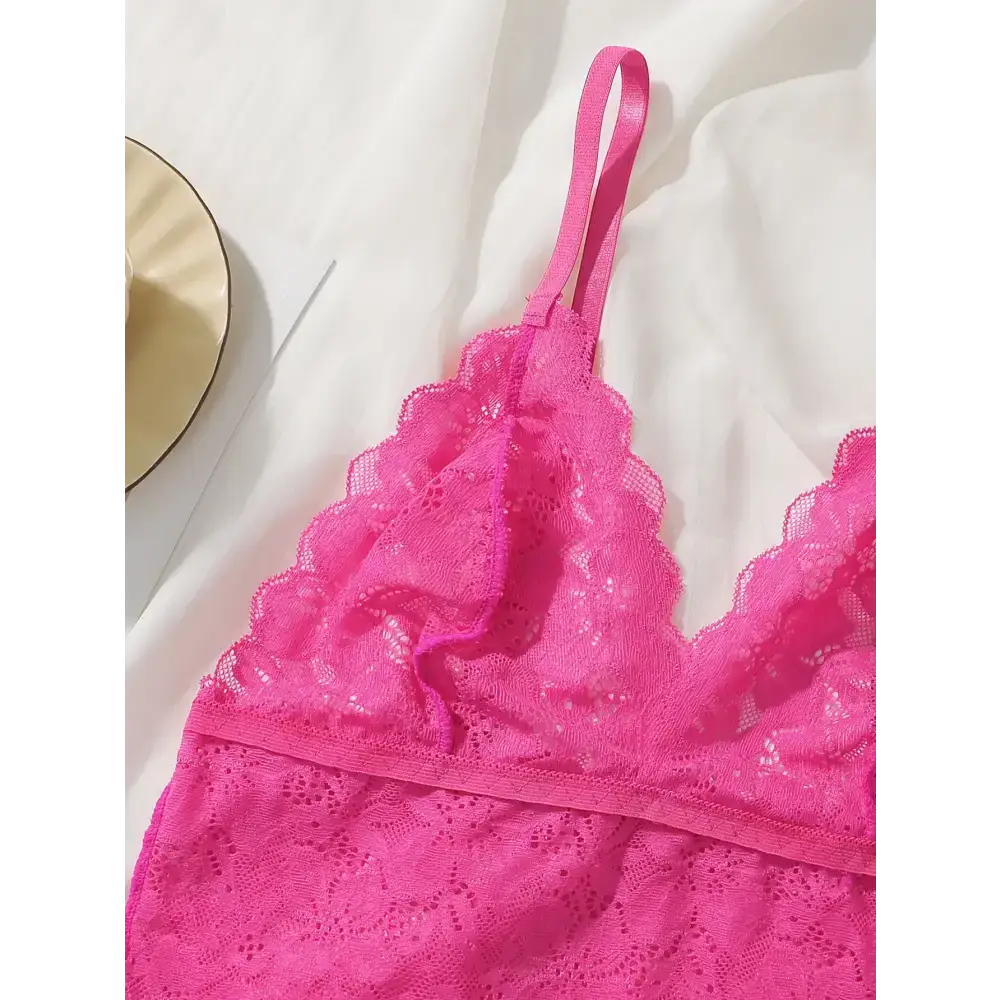 Pink lace bralette and panties set featuring delicate floral lace and adjustable straps