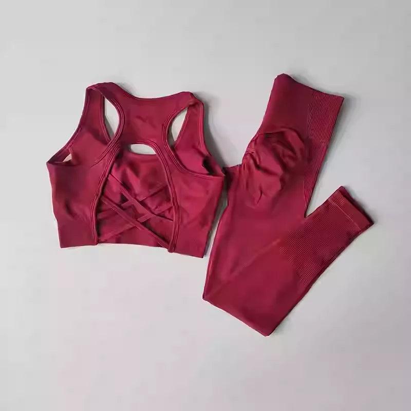 Stylish womens yoga set tracksuit in burgundy with a sleek racerback sports bra and matching leggings