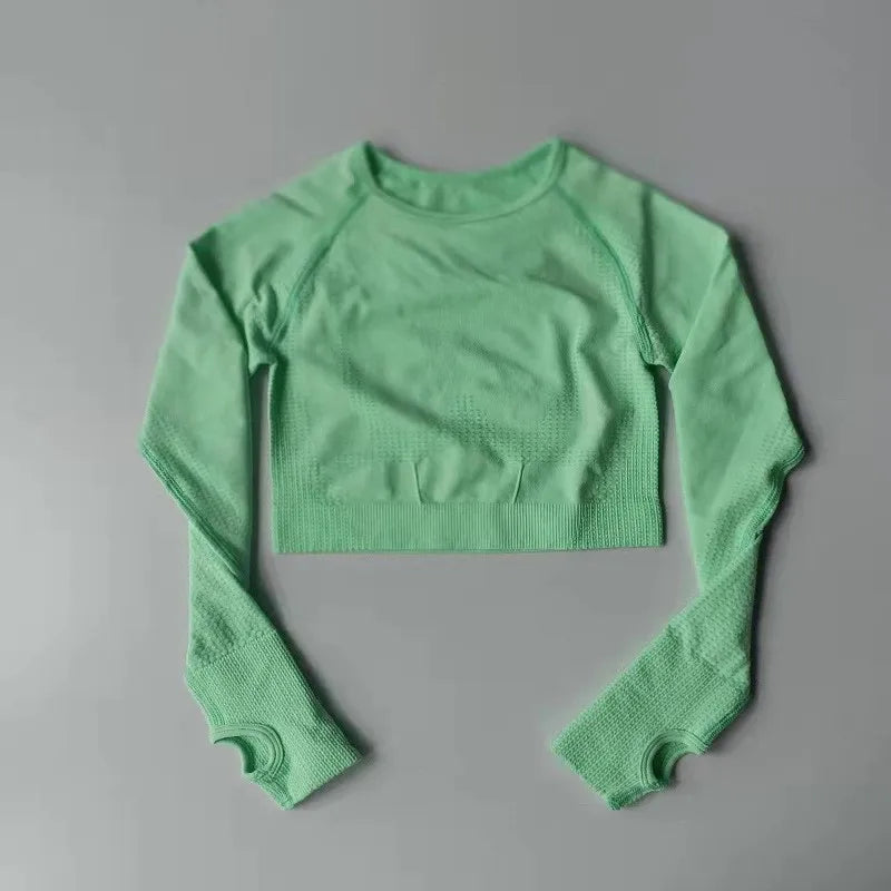 Light green yoga fitness tops for women with long sleeves and breathable fabric for comfortable workouts
